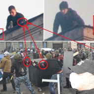 Červeno-černé pásky přes ruku je označení příslušníků fašistického Pravého sektoru